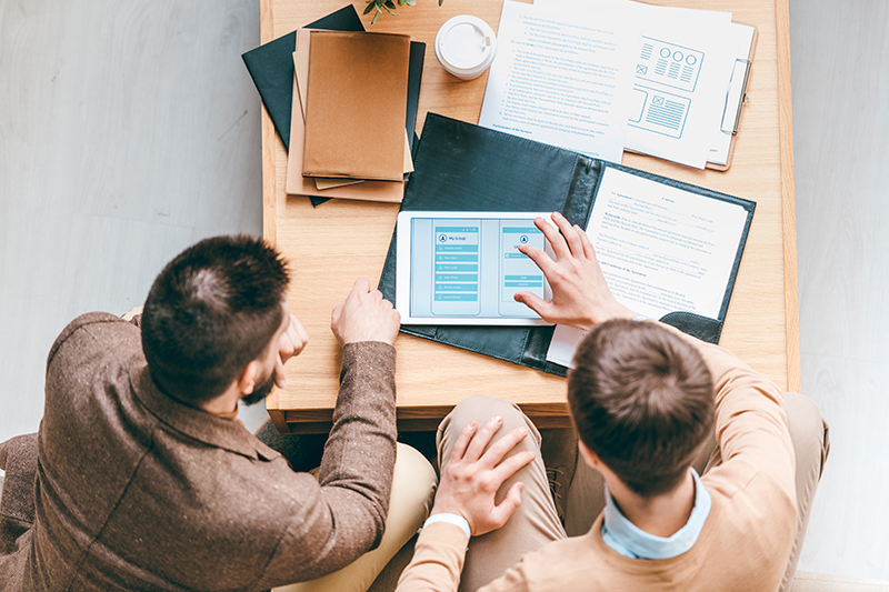 One of young software designers making presentation of new application